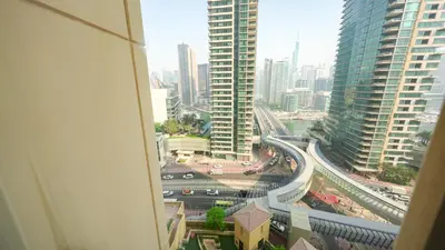 a view from a window of a city with buildings at Premium 1BR With Stunning Marina & Sea Views in Dubai
