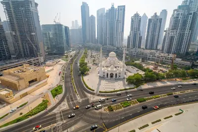 an aerial view of a city with buildings and traffic at Stylish Living at 8 Boulevard Walk, Downtown in Dubai