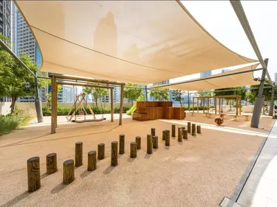 a pavilion with a playground in a building at 1BR in Emaar Burj Royale - 1min walk to Fountain&Dubai Mall, Burj view Pool & gym in Dubai