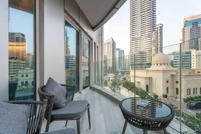 a balcony with a view of a city skyline at 1BR w Marina Views & Balcony in Dubai