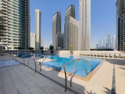 a swimming pool in a city with tall buildings at Exotic 2 bed downtown Burj Khalifa dist Dubai mall in Dubai