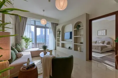 a large living room with a bed and a couch at Luxury 1BR Apt Dowtown Dubai Imperial Avenue with Burj Khalifa Views in Dubai