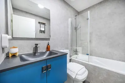a bathroom with a sink and a toilet and a shower at Fantastic 2 Bed - Marina in Dubai