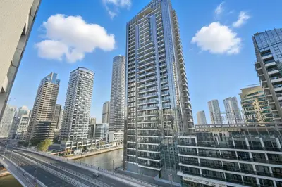a view of a city with tall buildings and a bridge at Fantastic 2 Bed - Marina in Dubai