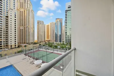 a tennis court on a balcony in a city at Fantastic 2 Bed - Marina in Dubai