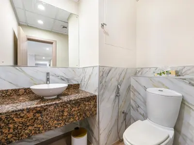 a bathroom with a sink and a toilet at Breathtaking Sea View and Dubai Eye 2BR in Dubai