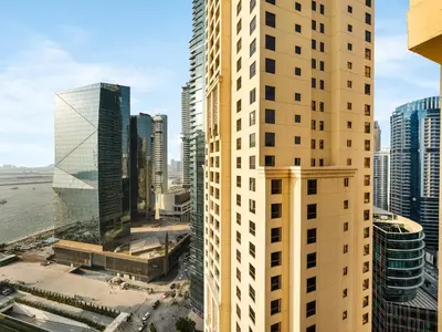 a view of a city with tall buildings at Breathtaking Sea View and Dubai Eye 2BR in Dubai