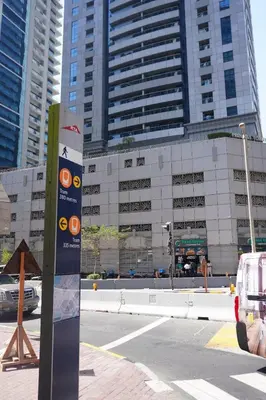 a city street with a building with tall buildings at Boho Style 2BHK Apartment With Sea View Next to Tram Station in Dubai