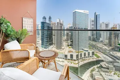 a balcony with a view of a city skyline at Medina Studio Burj Khalifa View in Dubai