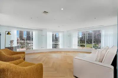 a living room with white furniture and large windows at Private villa in Marina with private pool!!! in Dubai