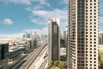 a view of a city with tall buildings and a highway at Stunning Studio facing Burj Khalifa in Dubai