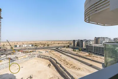 a view of a construction site from a building at Bookable Stylish Dubai escape with private pool in Dubai