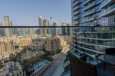 a view of a city from the balcony of a building at TRPS - Imperial Avenue, Downtown - Burj Khalifa View, Brand New, Amazing Facilities in Dubai