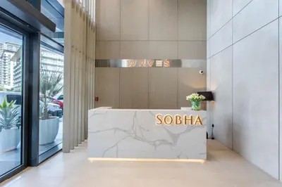 a lobby of a building with a sign that reads soba at STAY BY LATINEM Luxury 1BR Holiday Home W 2809 Near Burj Khalifa in Dubai