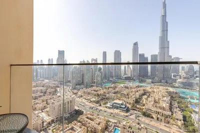 a view of a city from a window in a building at Full Burj Khalifa View, 3min Walk to Dubai Mall, 29th floor in Dubai