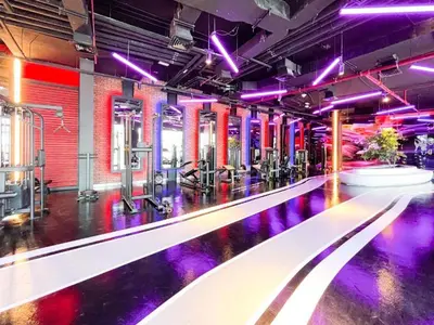 a bowling alley with purple lights in a building at HAVN - Studio in Al Jawhara, JVT in Dubai
