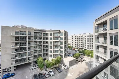 an overhead view of a parking lot with buildings at Brand New Designer Space with All Modern Amenities in Dubai
