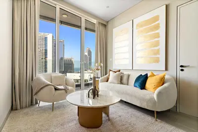 a living room with a couch and a table at Silkhaus Luxury 1BR at Marina Star in Dubai Marina in Dubai