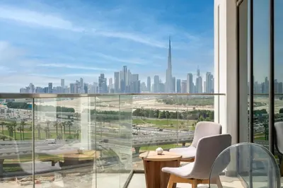 a room with a view of a city skyline at GuestReady - Furnished Studio | Burj & Canal Views in Dubai