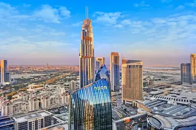 a view of a city with tall buildings at Private room in 3BR Ultra-Luxury-High-Rise Apartment next to BURJ KHALIFA, DUBAI MALL in Dubai