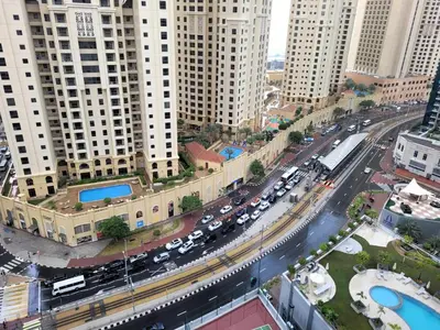 an overhead view of a busy city with traffic at Sansa Beach Home in Dubai