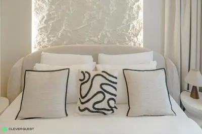 a group of pillows sitting on a couch at Clever Guest 031 Dubai Gate 2 in Dubai