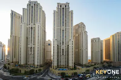 a group of tall buildings in a city at Magnificent Two Bedroom Beachfront in Dubai