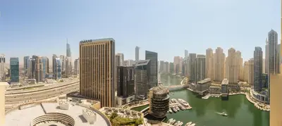 a view of a city with a river and buildings at Daniels 1BR at JW Marriott with Marina View in Dubai