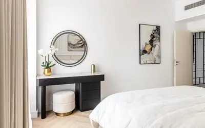 a white bedroom with a sink and a mirror at Spacious and luxurious 1 bed with amazing marina view!Rimal ! in Dubai