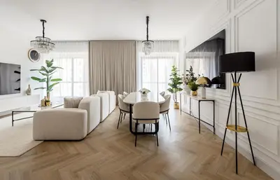 a white living room with a table and chairs at Spacious and luxurious 1 bed with amazing marina view!Rimal ! in Dubai