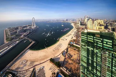 an aerial view of a city with a river at Exclusive 2BD in JBR Address with Ain Dubai View in Dubai