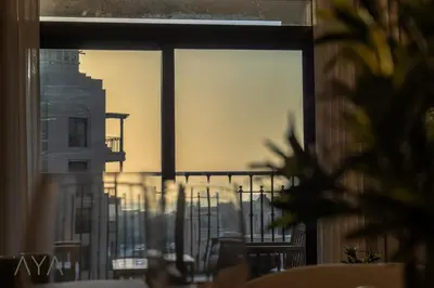 a view of a city from a window at Chic 1BR Apartment near Madinat Jumeirah BurjAlArab in Dubai