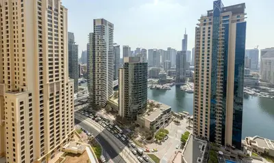 an aerial view of a city with tall buildings at Spacious and luxurious studio with amazing marina view!Rimal ! in Dubai