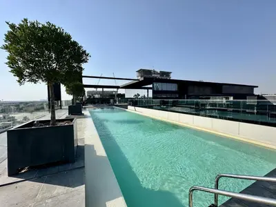 a large swimming pool on top of a building at City Walk Building 16, Al Wasl, Jumeirah - Mint Stay in Dubai