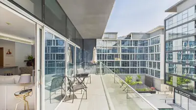 a balcony with a view of a building at City Walk Building 16, Al Wasl, Jumeirah - Mint Stay in Dubai
