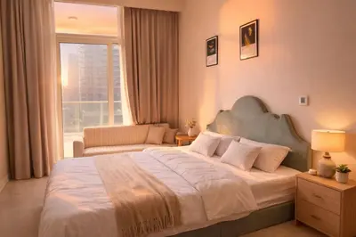 a bedroom with a large bed and a window at Family Stay in Downtown 2BR Sleeps 6 Burj View in Dubai