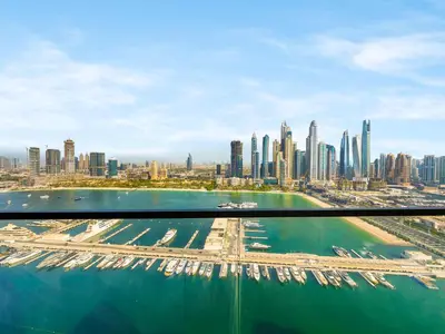 an aerial view of a city with tall buildings at Stylish 2 bedroom - Marina Views - Private Beach in Dubai