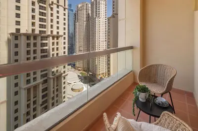 a balcony with a view of a city at Frank Porter - Sadaf 7, JBR in Dubai