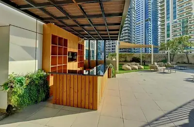 a lobby of a building with a view of buildings at Apartment in Dubai Marina with Sea View & Balcony & Pool in Dubai