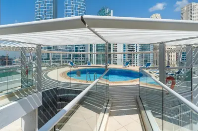 a swimming pool on the top of a cruise ship at Modern 2 Bedroom in Dubai Marina - Sea View in Dubai