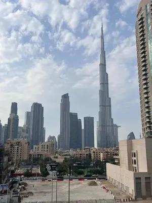 a view of a city skyline with a tall building at Mahenti - Mesmerizing views of The Burj & Downtown Dubai in Dubai
