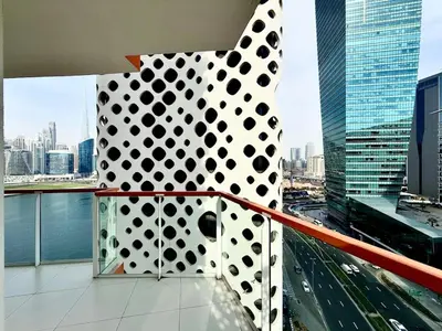 a view from the top of a building at Mahenti - 1BR - Stunning Lake & Burj Khalifa Views in Dubai