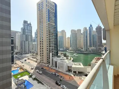 a view of a city from a balcony of a building at Mahenti - 1BR in Dubai Marina - Near Metro & Tram in Dubai