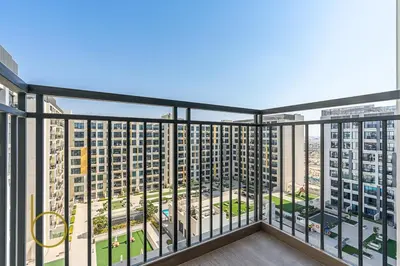 a balcony with a view of a city at Bookable 1 Bed Liva Tower with Pool & Garden in Dubai