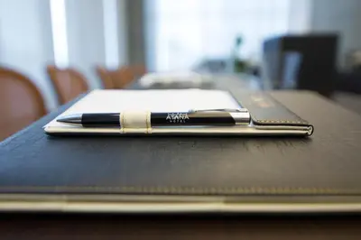 a pen sitting on top of a table at Atana Hotel in Dubai
