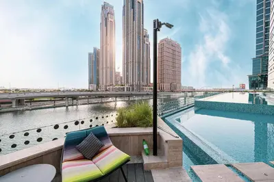a view of a city skyline with a pool at Mahogany 19 - 2BR 6PAX - Infinity Pool Stylish Flat in Dubai
