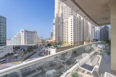 a view of a city from the balcony of a building at StayShort - Premium 2BR in Dubai Marina - Sleeps 4 in Dubai