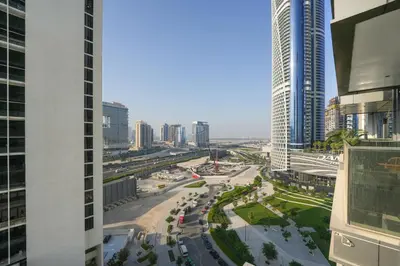 an aerial view of a city with tall buildings at Trophy Soft tones sharp style Masterpiece 705 in Dubai