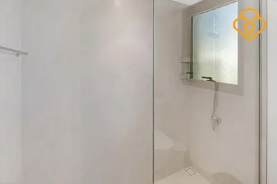 a shower with an orange heart on the glass door at 3 BR W Maid Walk to Pool, Arabian Ranches III Ruba in Dubai