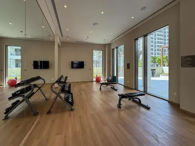 a gym with several exercise bikes in a room at Frank Porter - Lotus at Creek Beach in Dubai